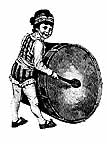 boy beats drum 
