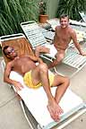Paul & Josh relax by the pool at Club St. Louis