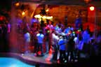 Dancing in black light by the pool at Ma�ana